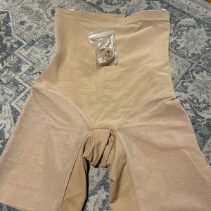 Honey Love superpower short in sand